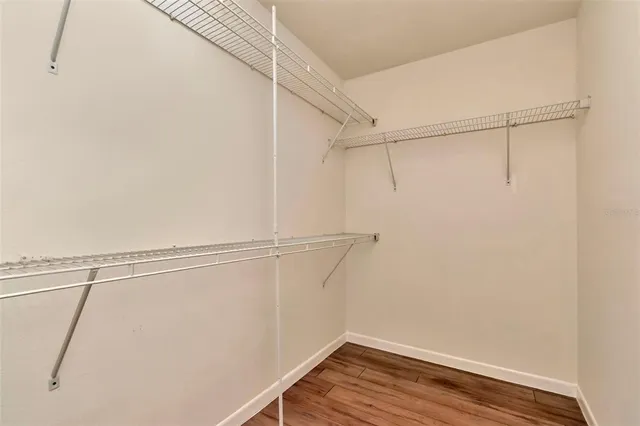 a view of a room with racks on the wall