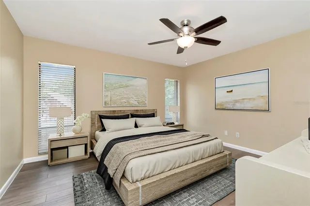 a bedroom with a bed and window