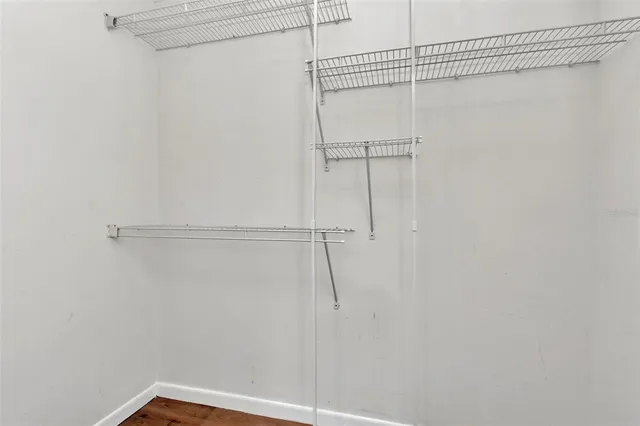 a view of a room with racks on the wall