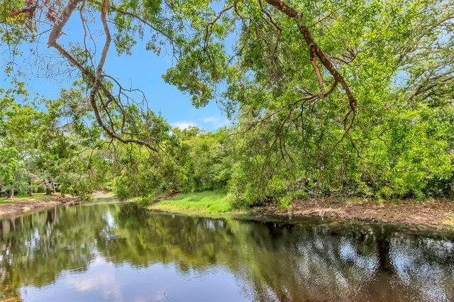 a view of house with outdoor space and entertaining space
