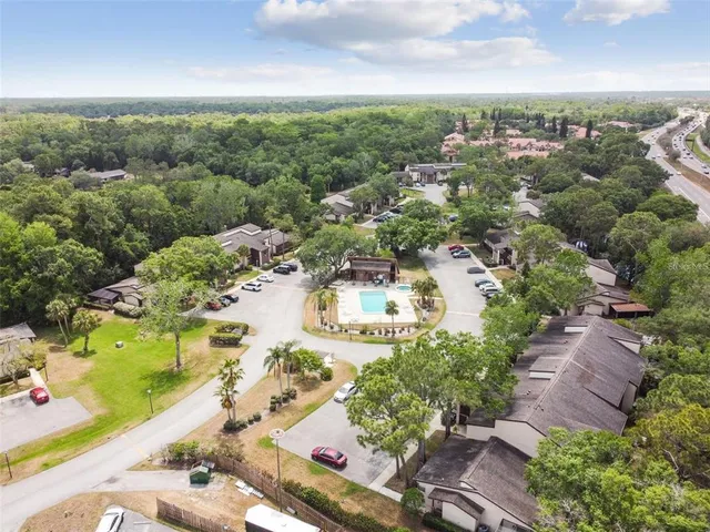 a bathroom with a toilet and a bath tub