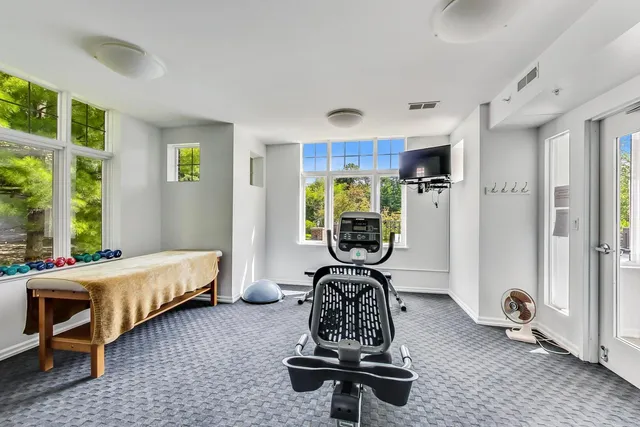 a room with furniture and a window