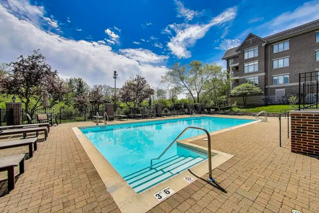 a view of swimming pool with a patio