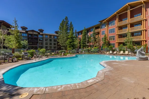 a view of a swimming pool with a outdoor space