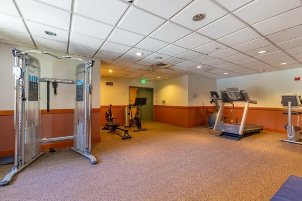 a view of a room with gym equipment