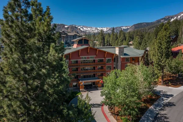 a view of a city with a building in the background