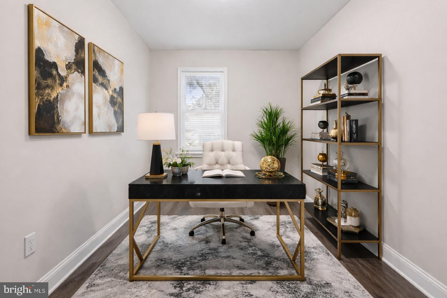 1724 East 25th Street Baltimore, MD 21213 - Photo 6 of 10 a view of a workspace with furniture