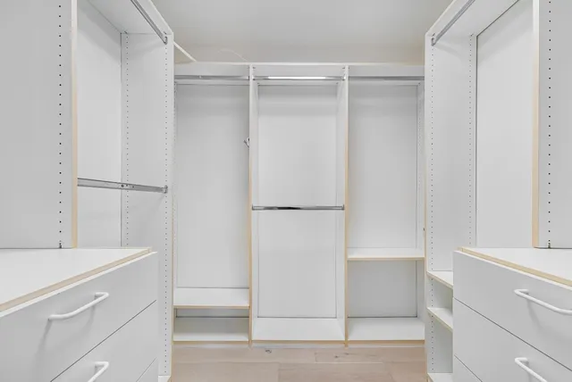 a workspace with furniture and a potted plant