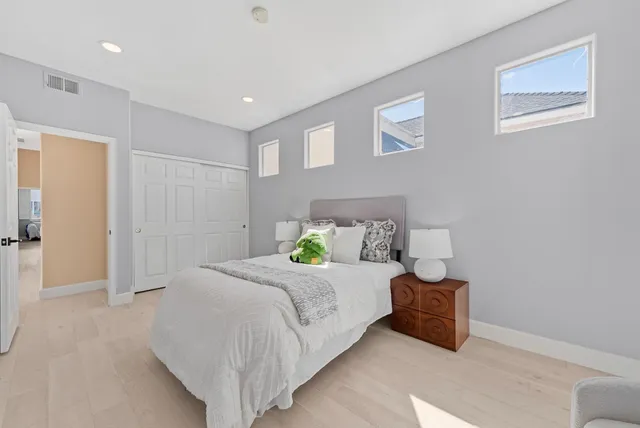 a bathroom with a sink toilet and mirror