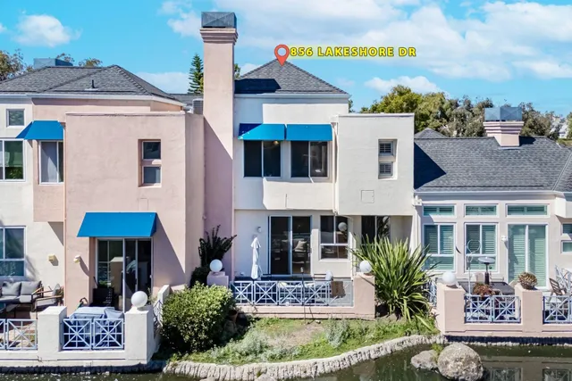 a view of a lake with a building in the background