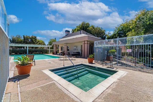 a view of a balcony with city view