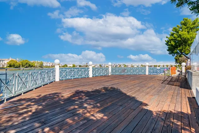 a view of a lake with a building in the background