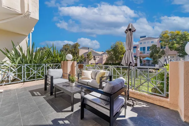 a view of a terrace with furniture