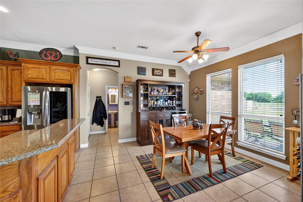 1035 Highland Road Cleburne, TX 76033 - Photo 7 of 36 a view of a dining room with furniture window and outside view