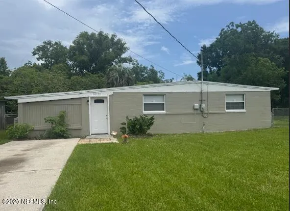 front view of house with a yard