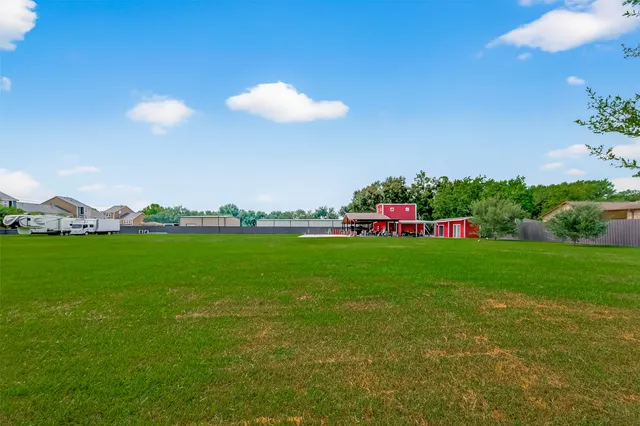 a view of a golf course with a swimming pool