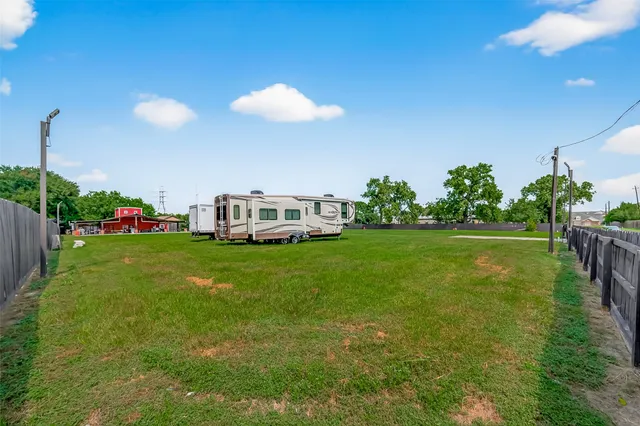a view of a golf course with a lake