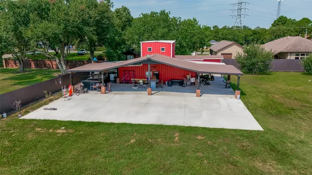 an outdoor space with furniture and garden