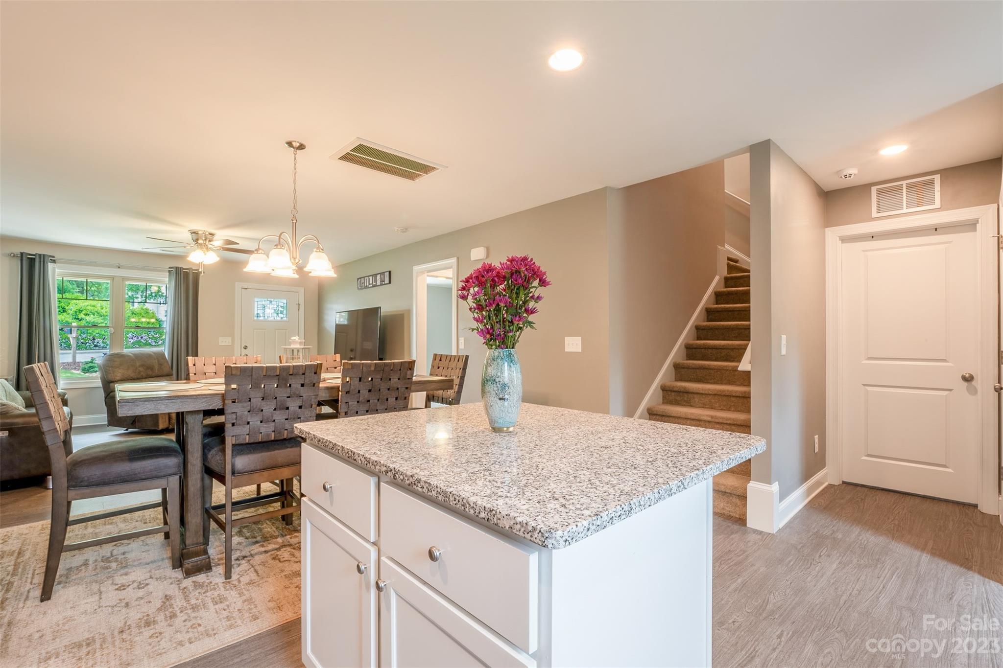 212 Old Centergrove Road Kannapolis, NC 28083 - Photo 11 of 39 a view of a dining room with furniture and a chandelier