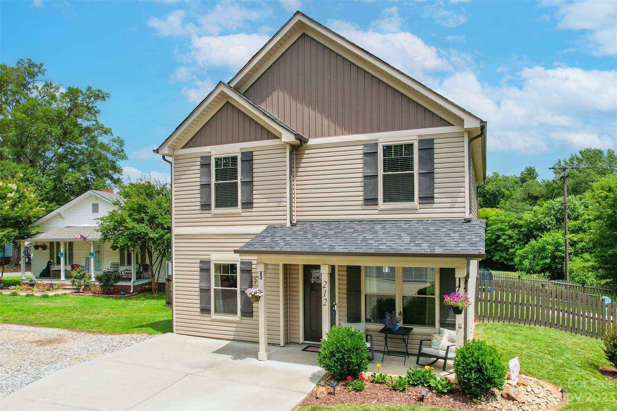 212 Old Centergrove Road Kannapolis, NC 28083 - Photo 2 of 39 a view of a house with a yard and plants