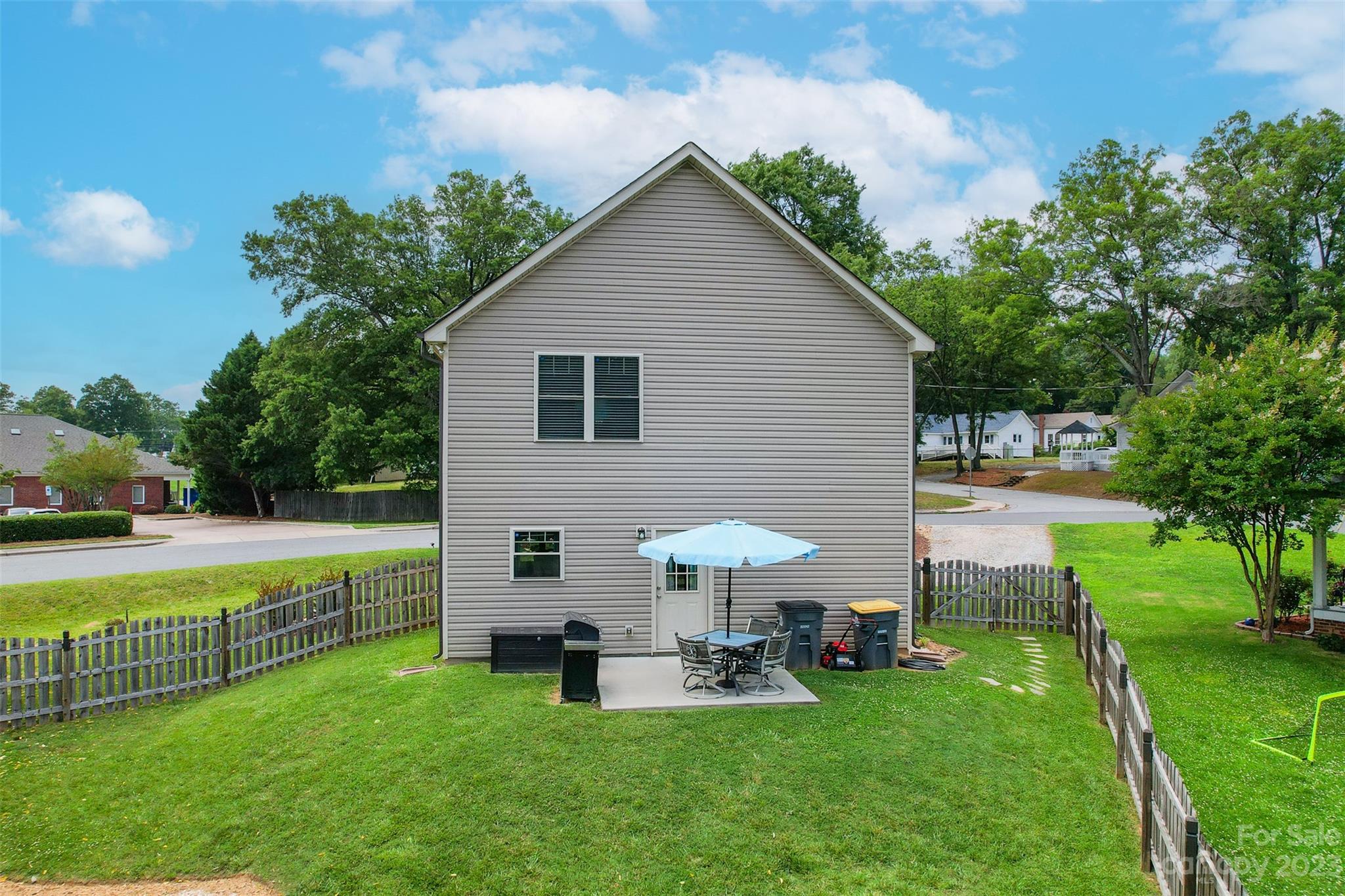 212 Old Centergrove Road Kannapolis, NC 28083 - Photo 33 of 39 a view of a house with a yard and sitting area