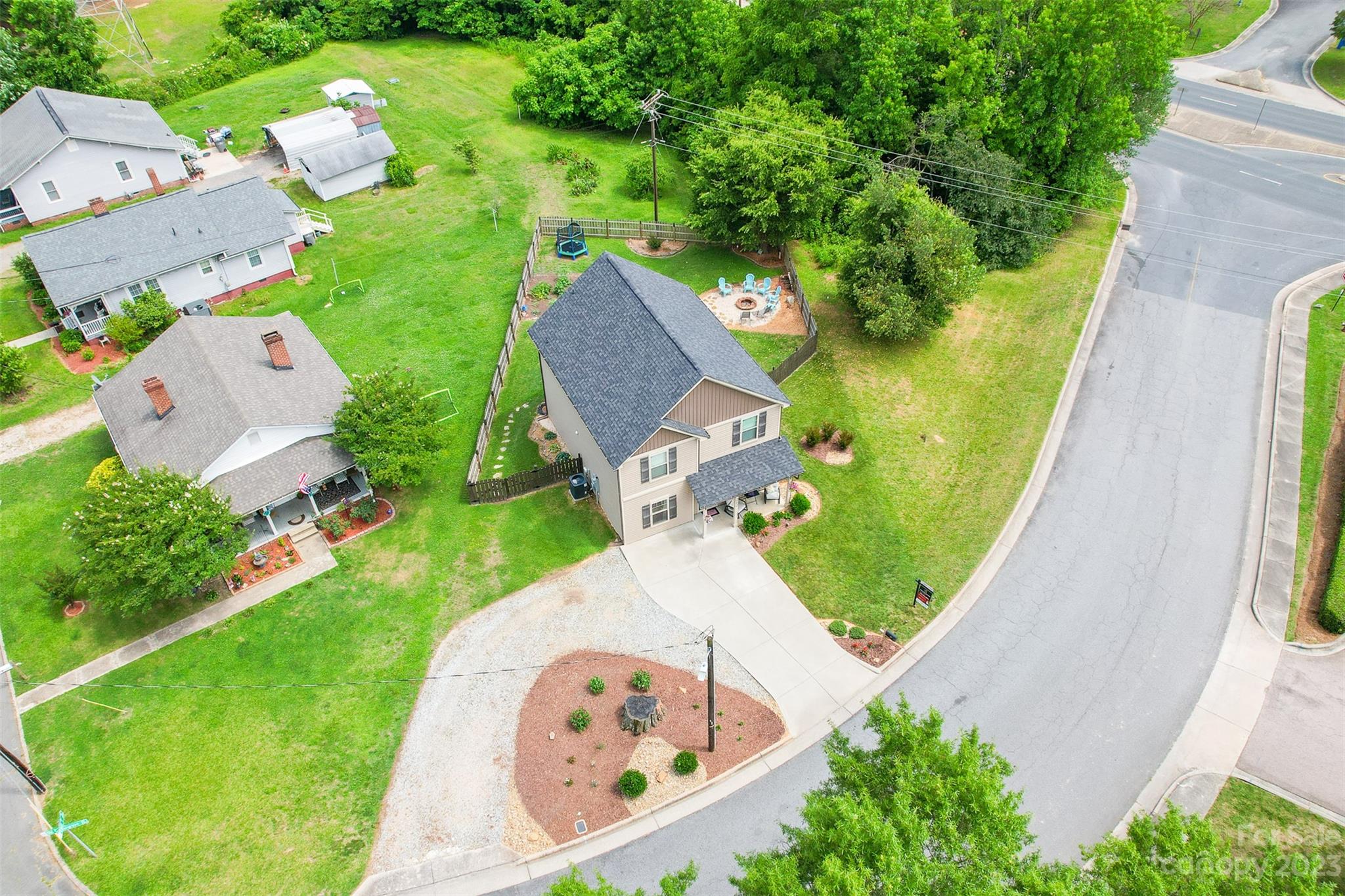 212 Old Centergrove Road Kannapolis, NC 28083 - Photo 35 of 39 an aerial view of a house with a garden and swimming pool