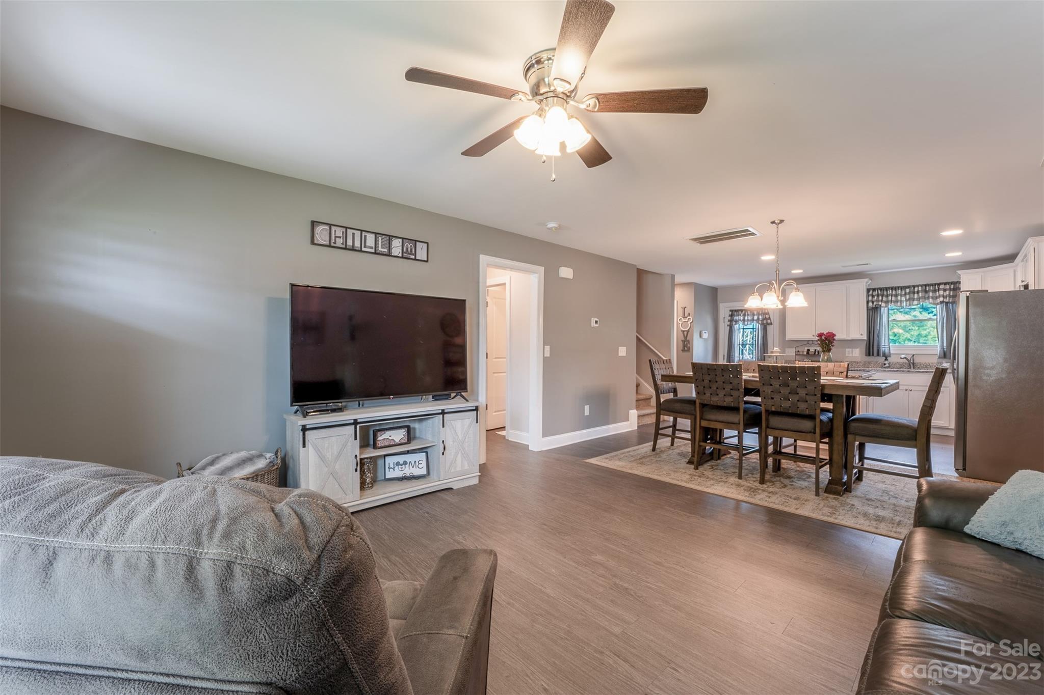 212 Old Centergrove Road Kannapolis, NC 28083 - Photo 4 of 39 a view of a livingroom with furniture and a flat screen tv