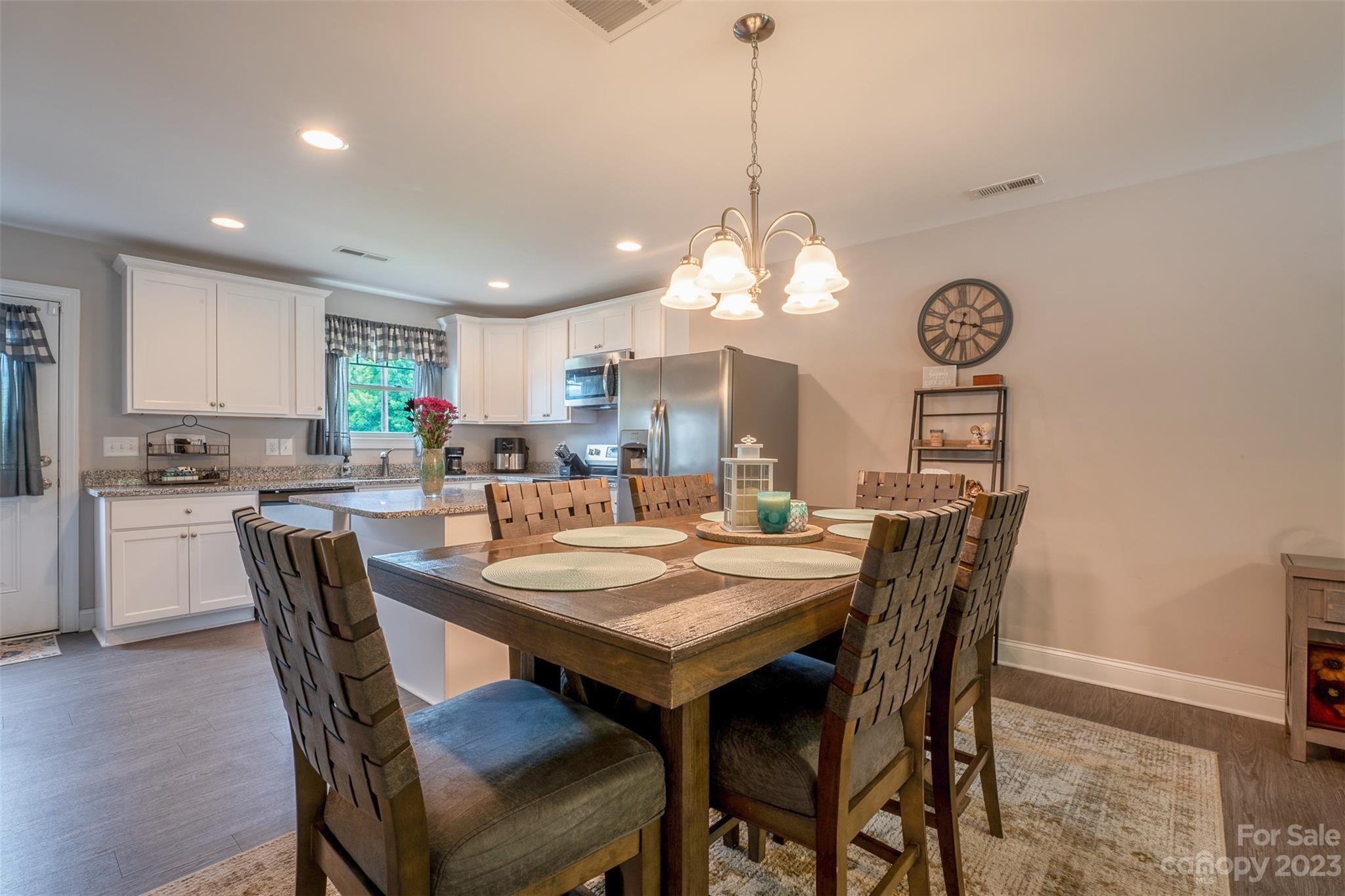 212 Old Centergrove Road Kannapolis, NC 28083 - Photo 10 of 39 a view of a dining room and chandelier