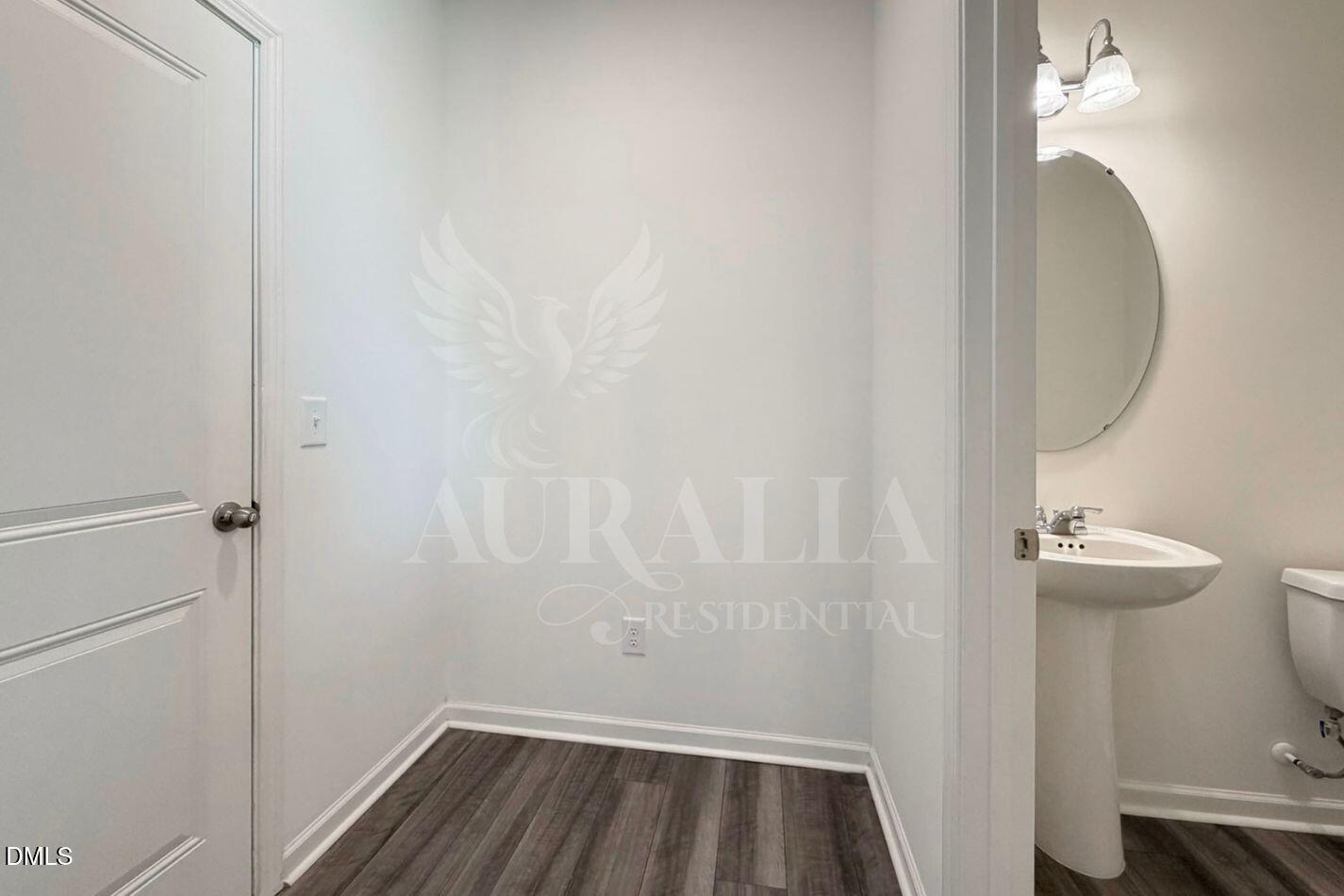 937 Berkeley Glen Road Zebulon, NC 27597 - Photo 11 of 35 a bathroom with a sink and toilet