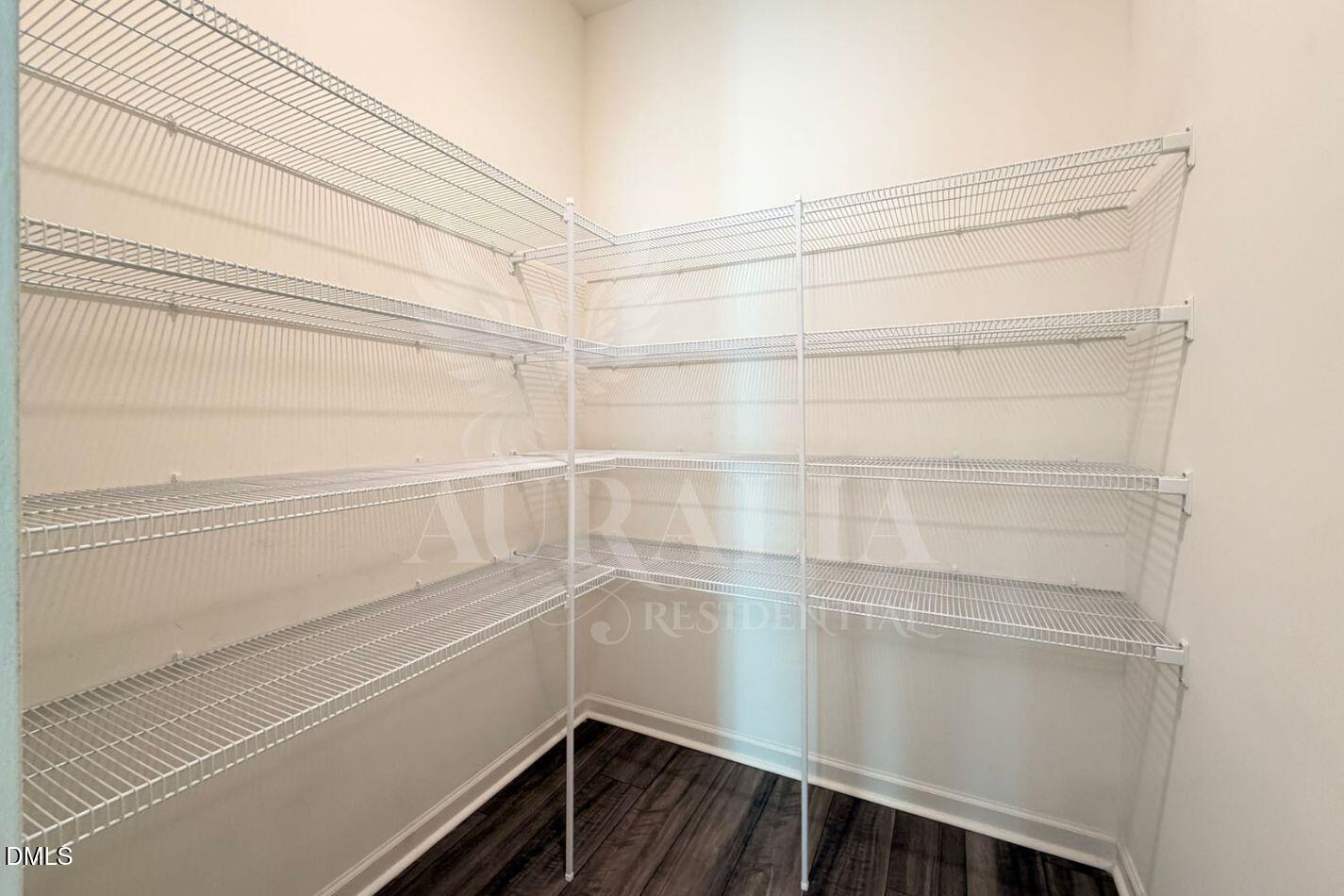 937 Berkeley Glen Road Zebulon, NC 27597 - Photo 14 of 35 a view of a room with empty racks