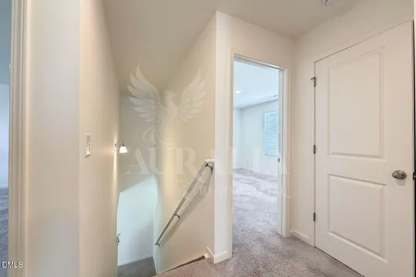 a view of a bathroom from a hallway