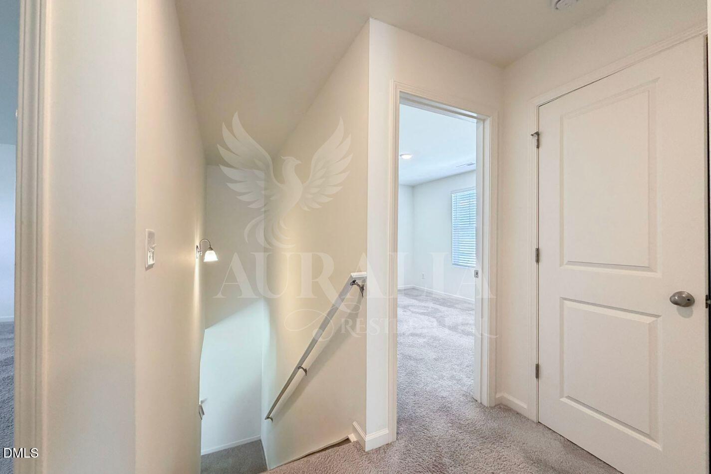 937 Berkeley Glen Road Zebulon, NC 27597 - Photo 16 of 35 a view of a bathroom from a hallway