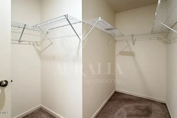 a view of a room with racks on the wall