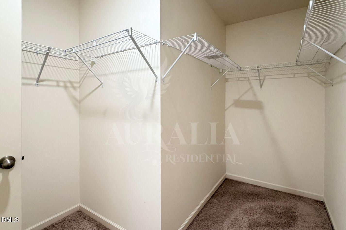 937 Berkeley Glen Road Zebulon, NC 27597 - Photo 30 of 35 a view of a room with racks on the wall