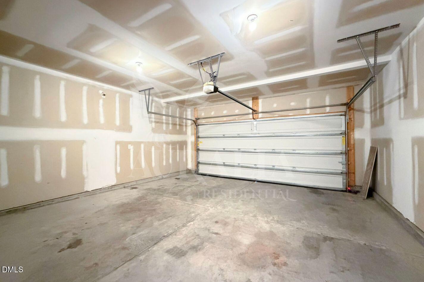 937 Berkeley Glen Road Zebulon, NC 27597 - Photo 31 of 35 a view of an empty room with a window