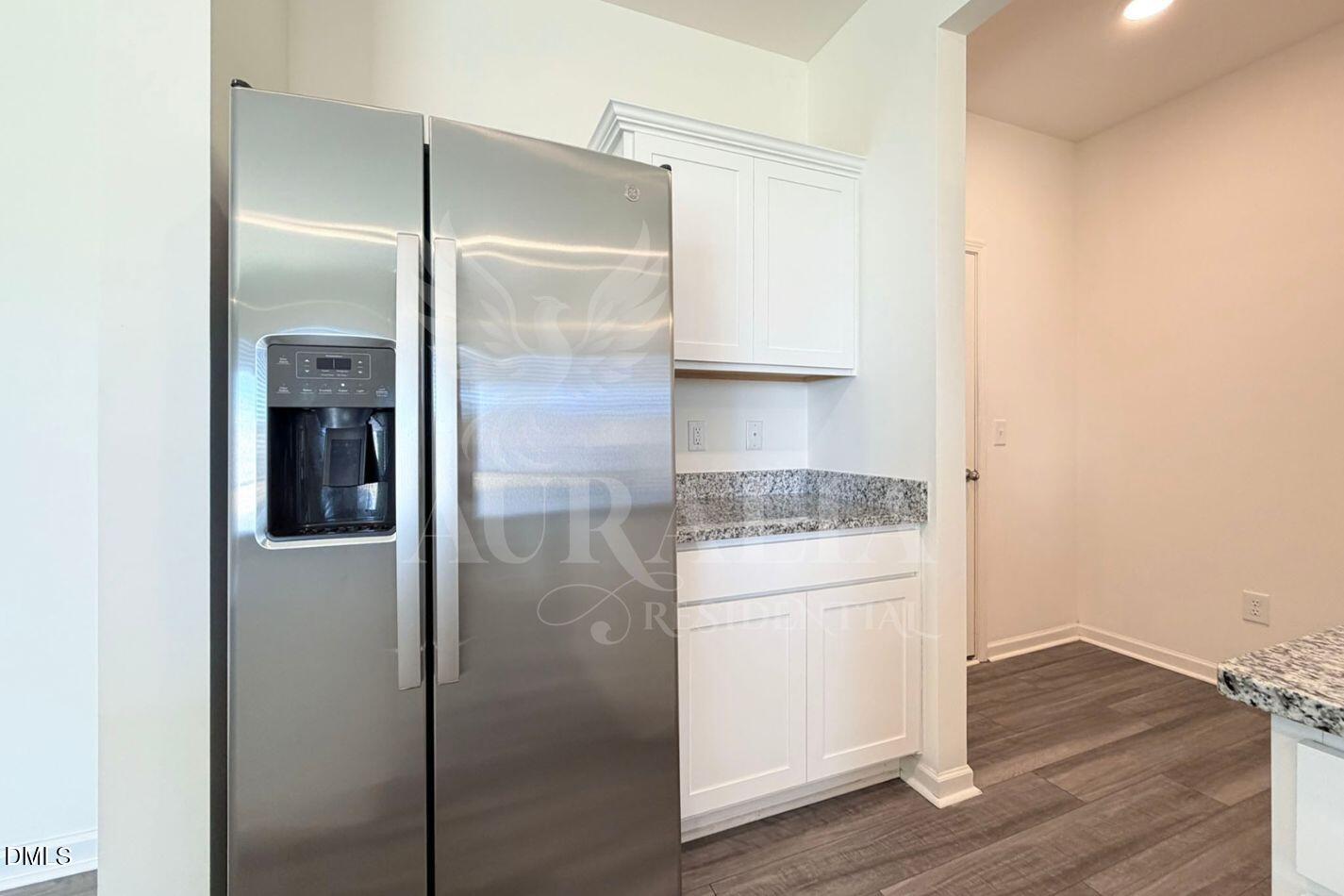 937 Berkeley Glen Road Zebulon, NC 27597 - Photo 10 of 35 a bathroom with a granite countertop shower a sink and a stove