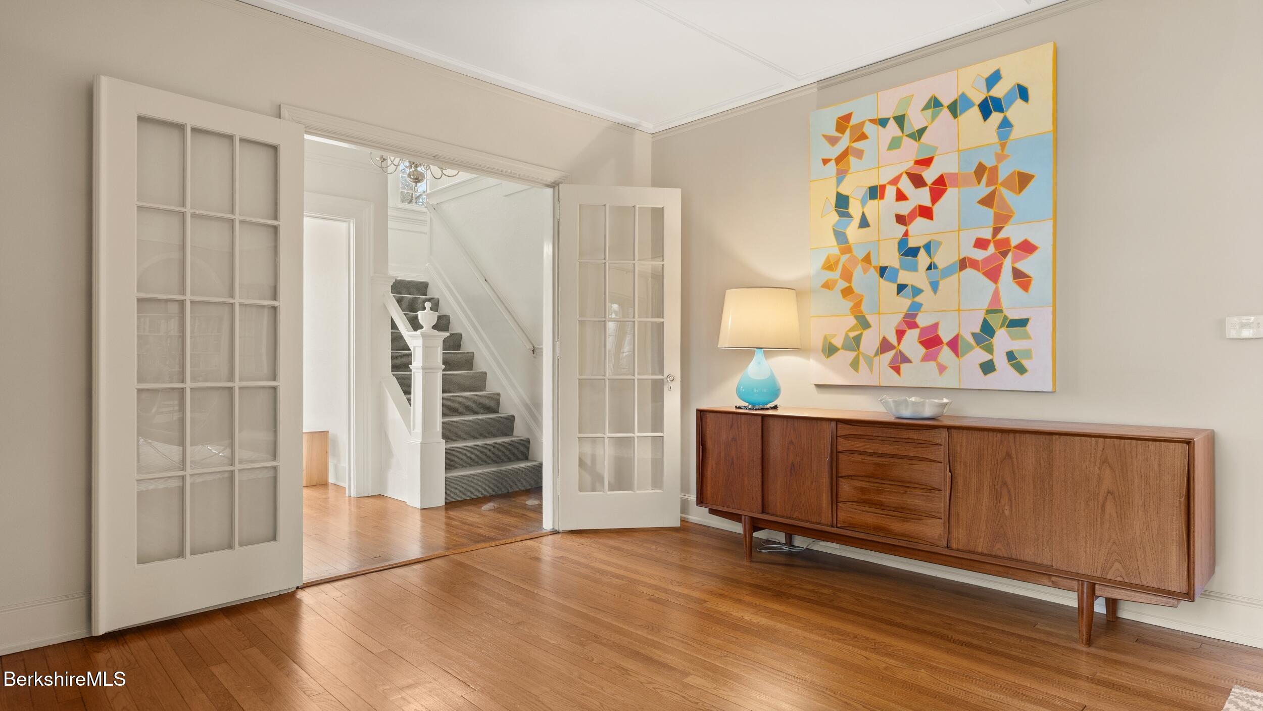 69 Commonwealth Avenue Pittsfield, MA 01201 - Photo 13 of 40 a view of an entryway with wooden floor
