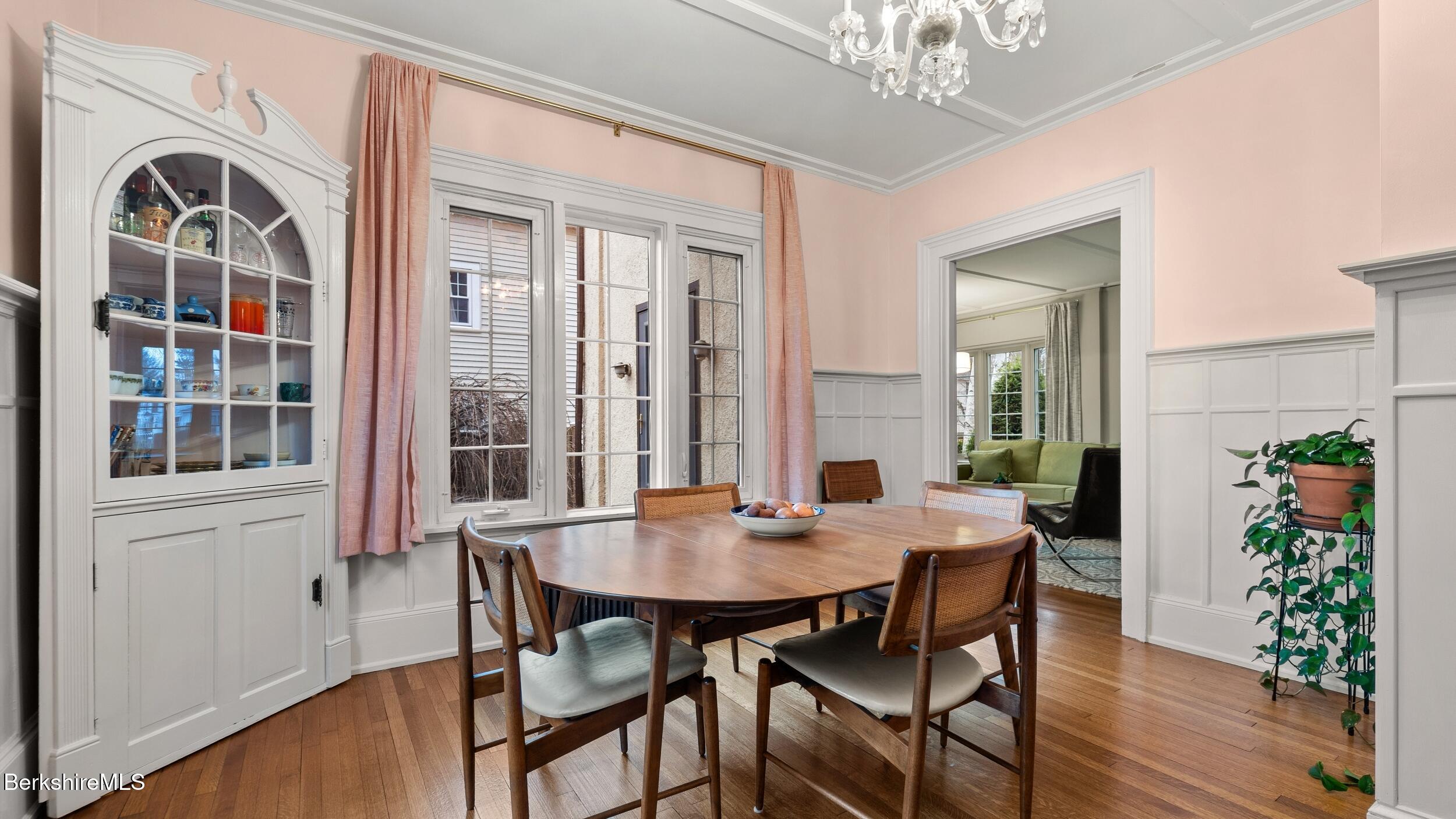 69 Commonwealth Avenue Pittsfield, MA 01201 - Photo 17 of 40 a view of a dining room with furniture window and wooden floor