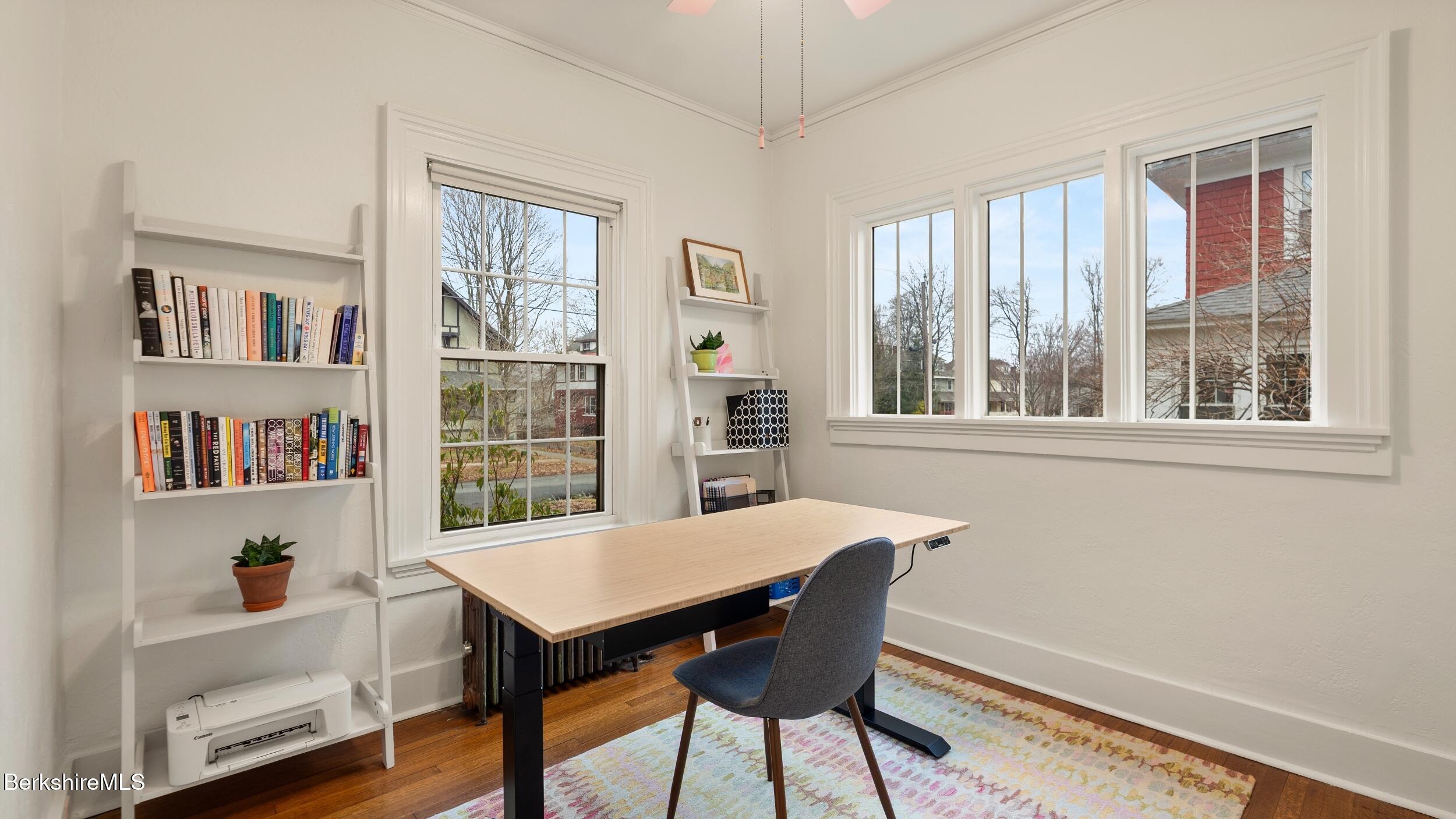 69 Commonwealth Avenue Pittsfield, MA 01201 - Photo 19 of 40 a view of a dining room with furniture window and wooden floor