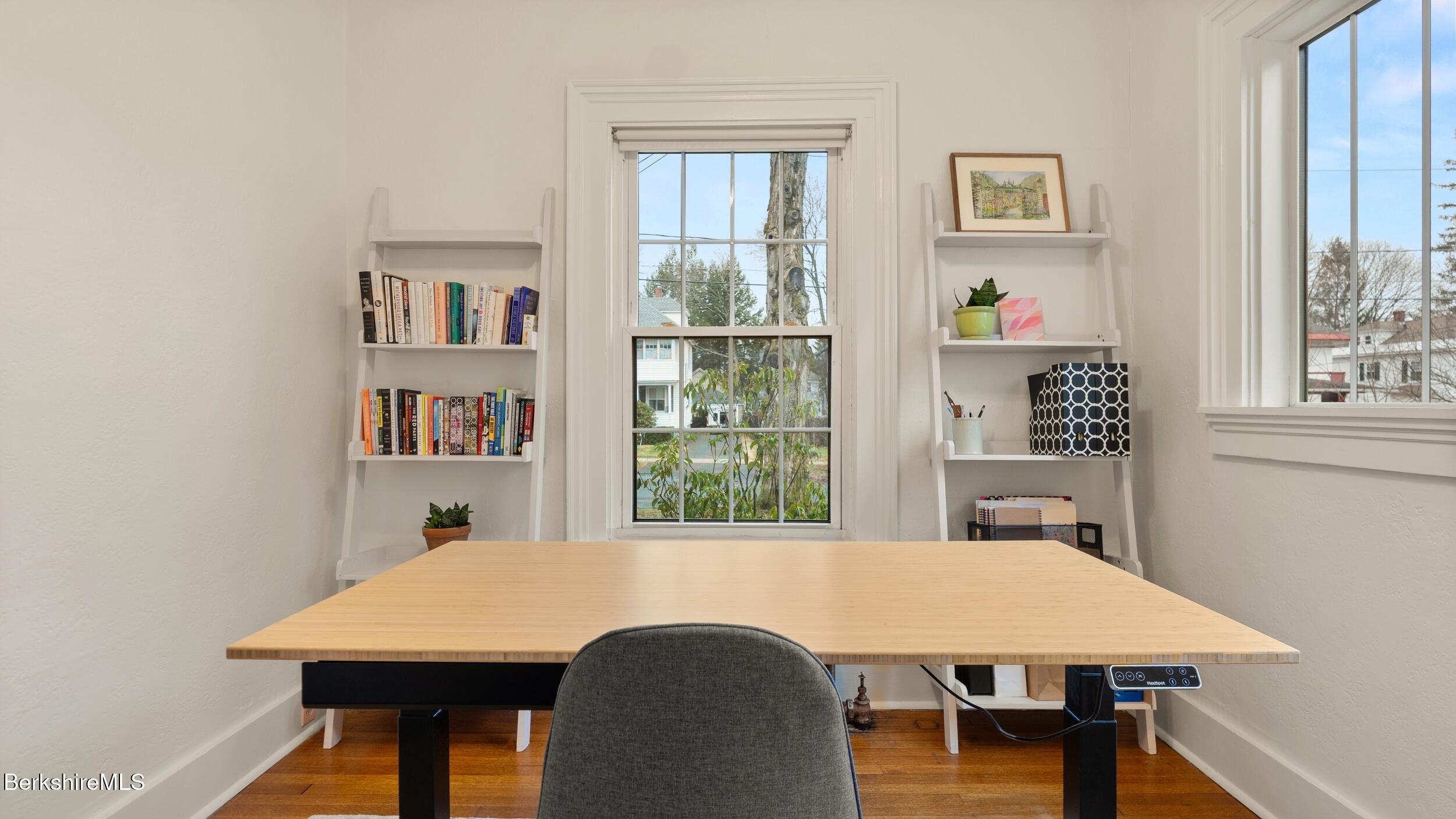 69 Commonwealth Avenue Pittsfield, MA 01201 - Photo 20 of 40 a view of a dining room with furniture window and outside view