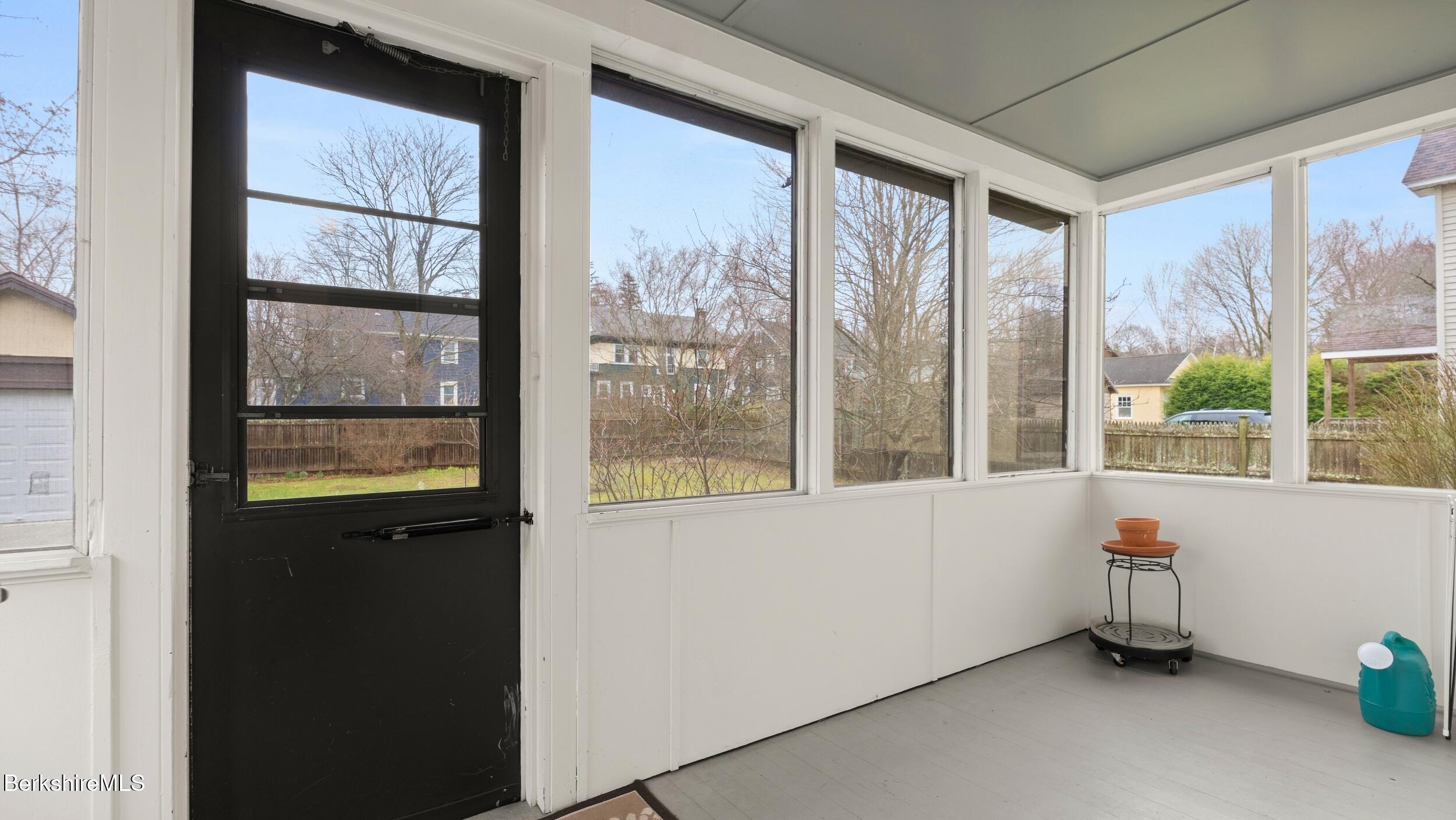 69 Commonwealth Avenue Pittsfield, MA 01201 - Photo 23 of 40 a view of an empty room with a window