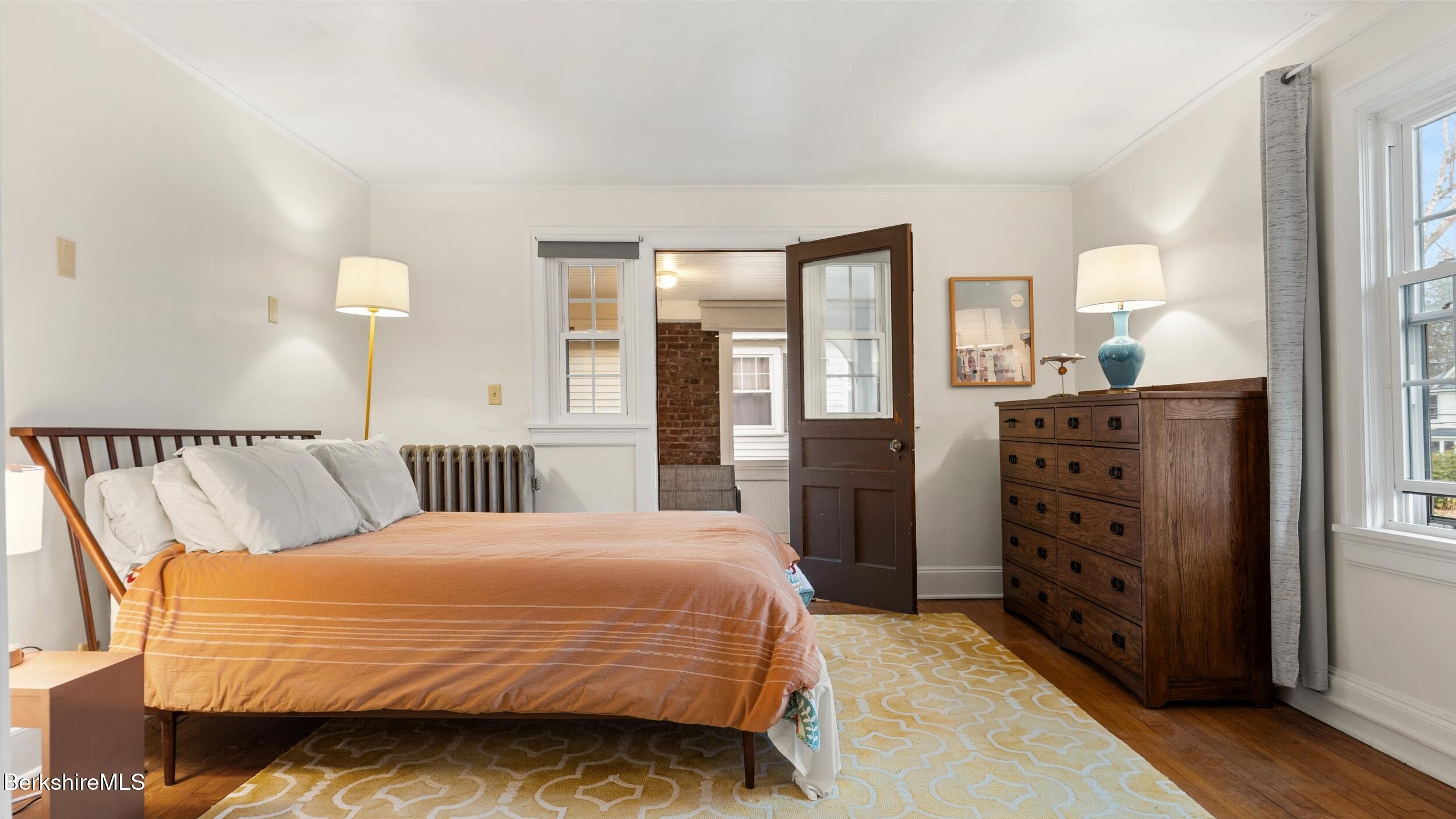 69 Commonwealth Avenue Pittsfield, MA 01201 - Photo 25 of 40 a bedroom with a bed and with furniture