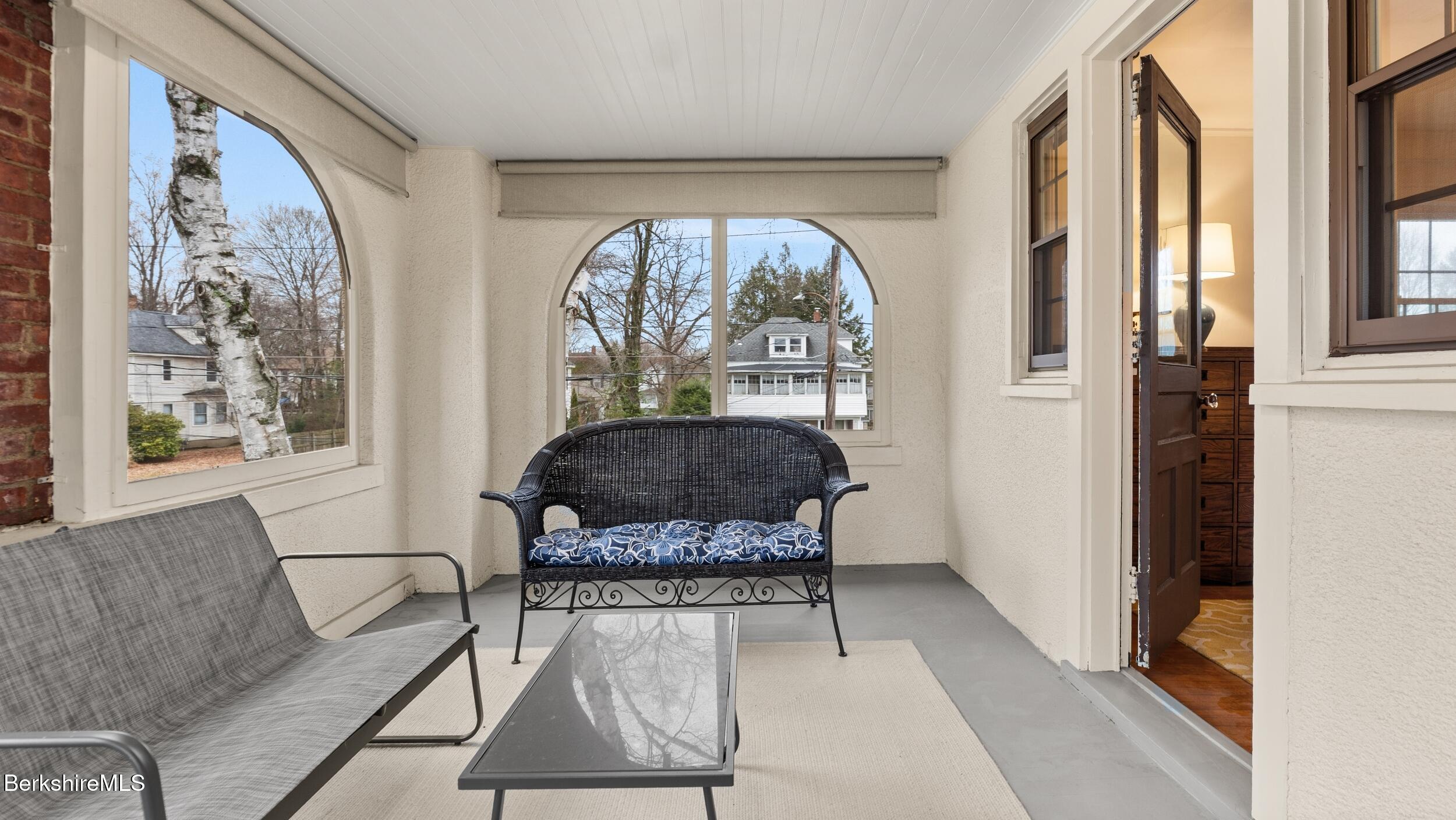 69 Commonwealth Avenue Pittsfield, MA 01201 - Photo 28 of 40 a living room with furniture and a large window