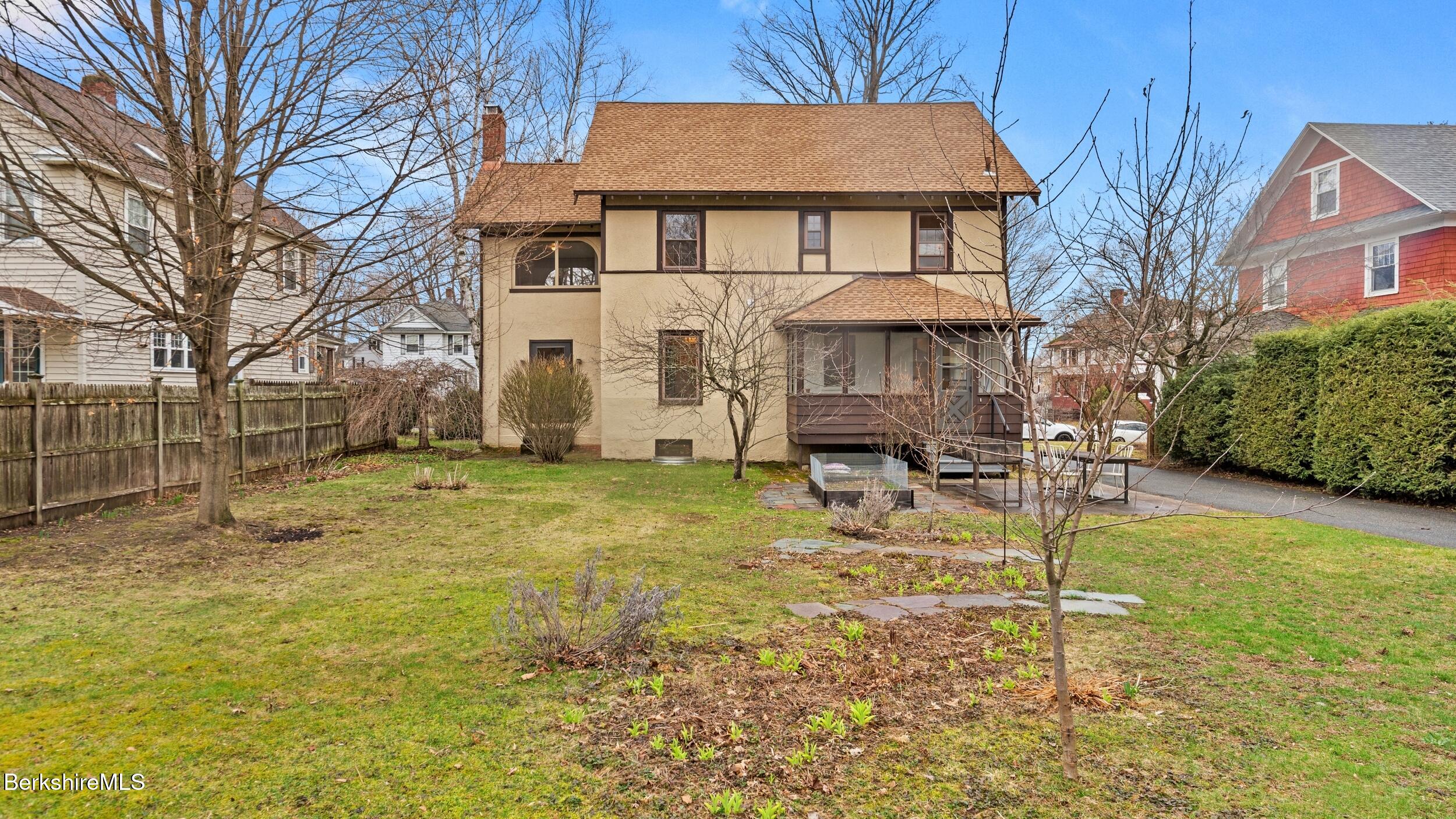 69 Commonwealth Avenue Pittsfield, MA 01201 - Photo 3 of 40 a view of a house with a yard