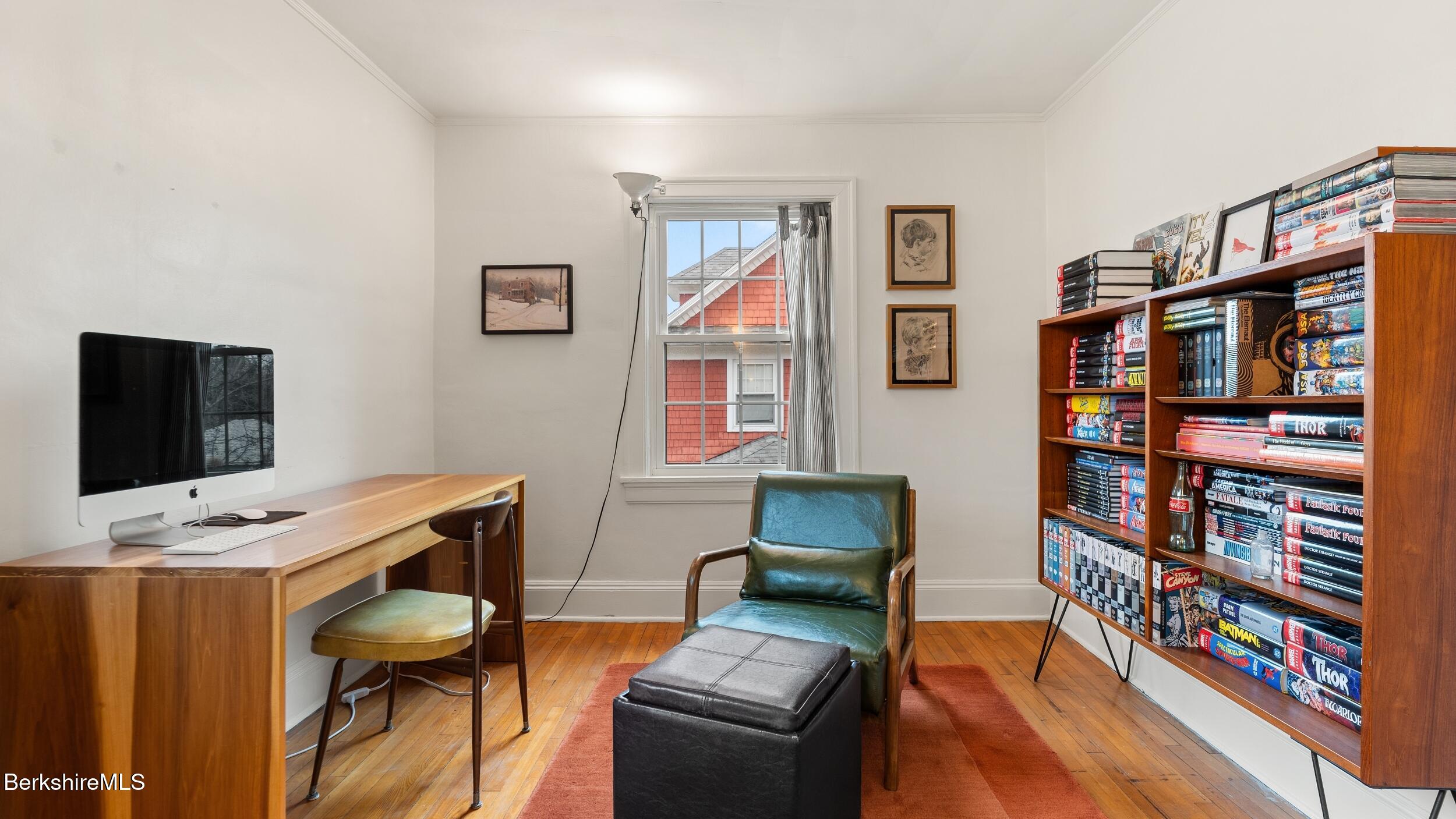 69 Commonwealth Avenue Pittsfield, MA 01201 - Photo 32 of 40 a view of a workspace with furniture and toys