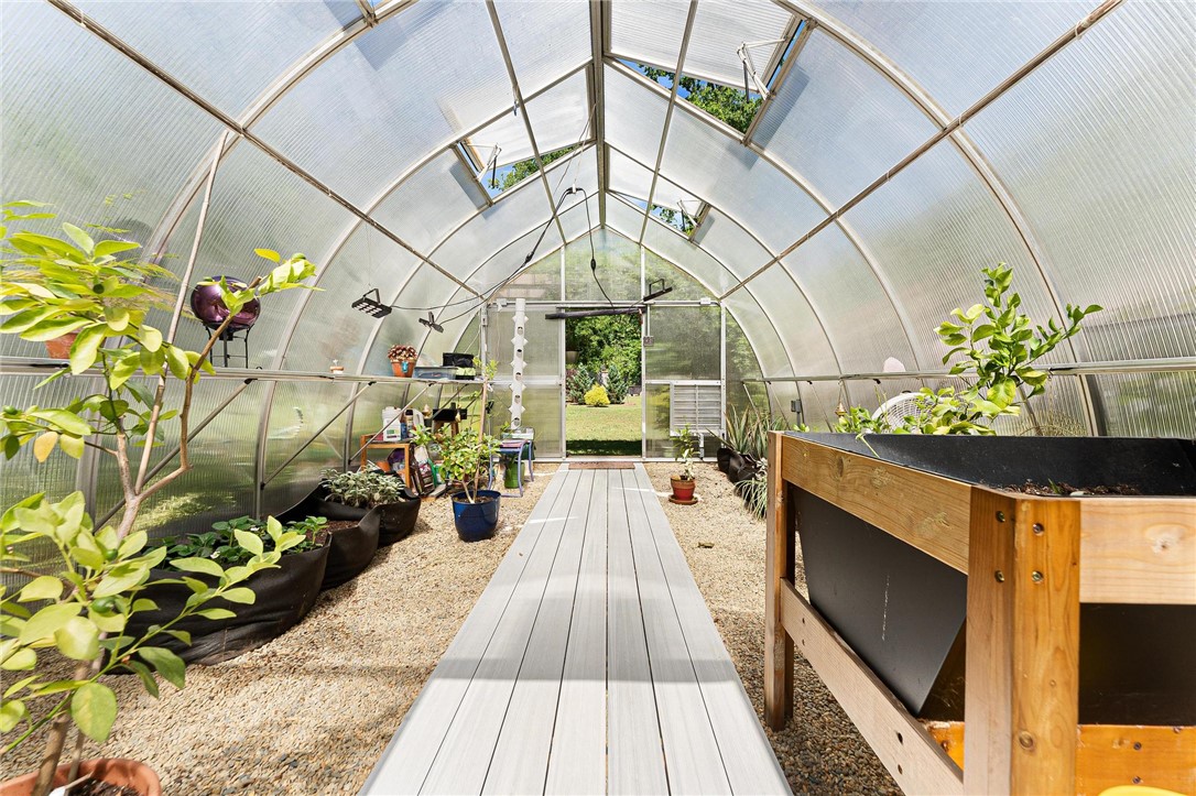 112 Water Falls Road Sunset, SC 29685 - Photo 47 of 50 interior greenhouse w/ 3 wall panels and heater for winter