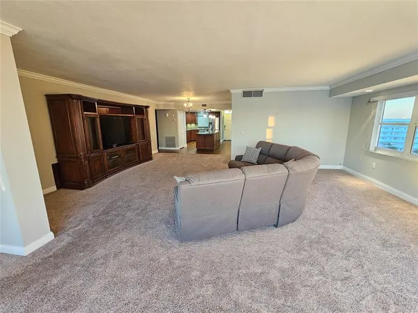 a living room with furniture and a couch