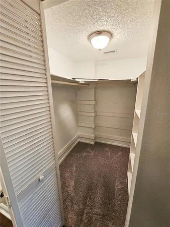 a view of a room with rack on the wall