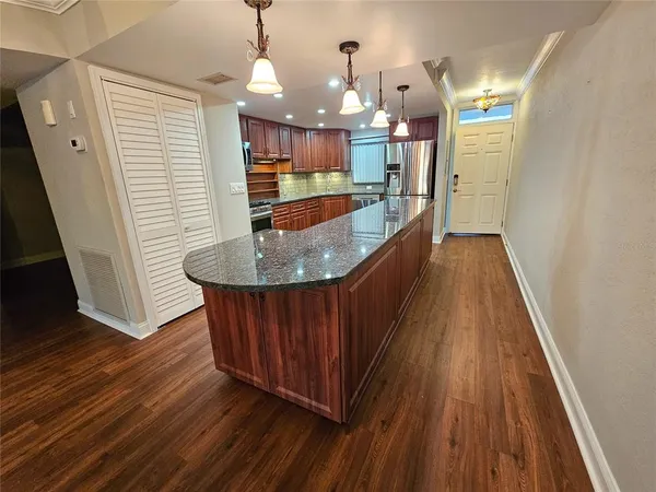 a dining room with wooden floor