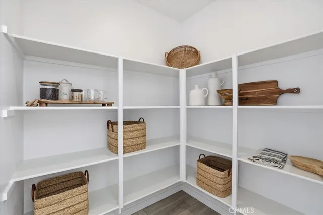a view of a livingroom with furniture and closet